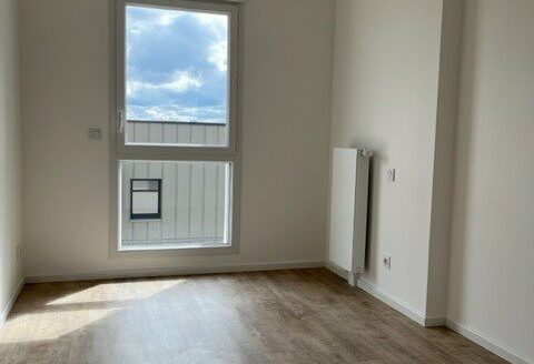 Dispositif PINEL - F3 de 63m² - quartier DOCKS 76 - stationnement - balcon